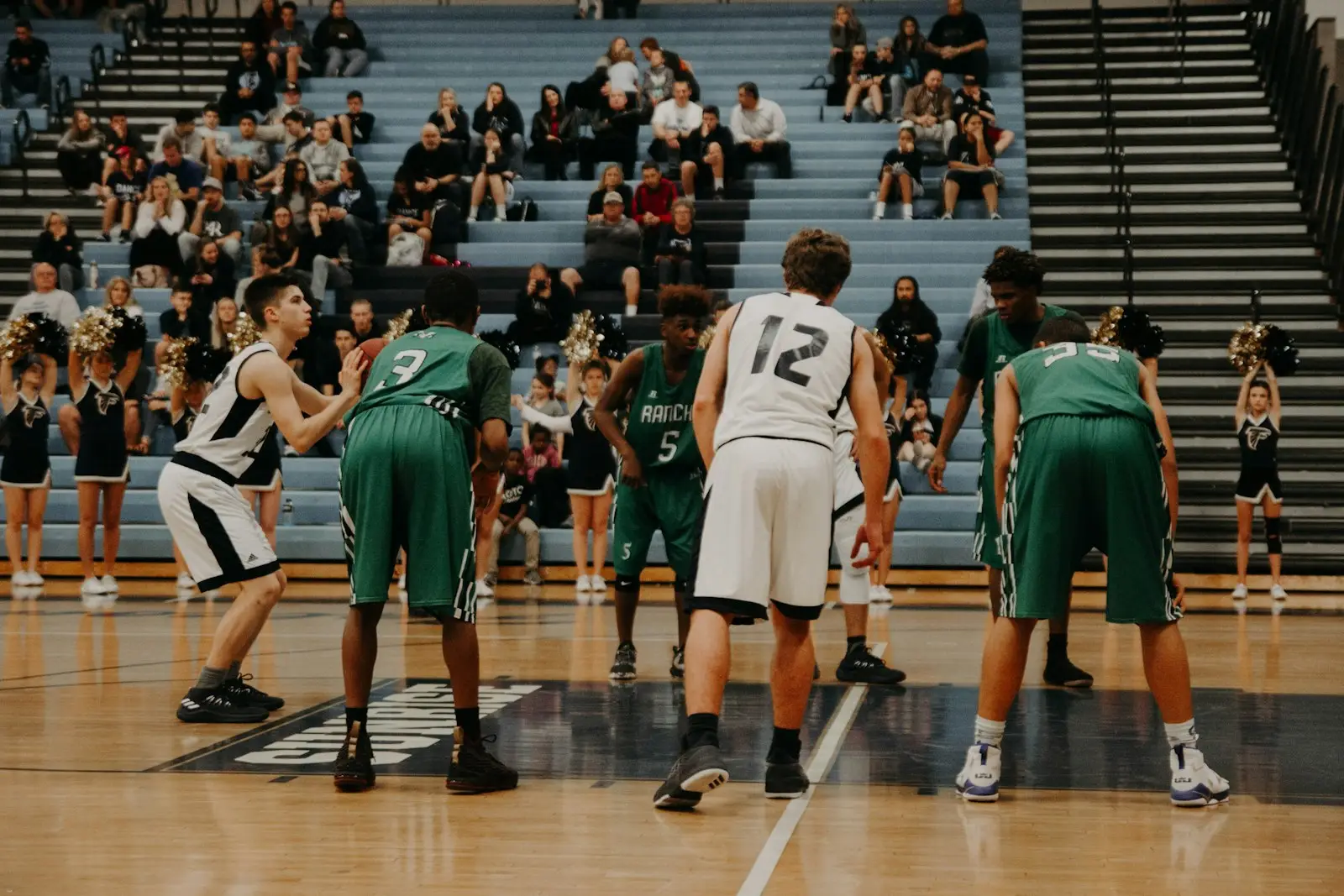 Basketball players lined up for a free throw